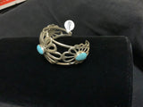 Navajo Handcrafted Sterling Silver and genuine turquoise bracelet by Daniel Mike.