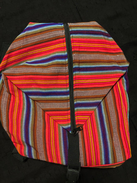 Handwoven Guatemalan Cotton made into a combination back pack or shoulder bag.