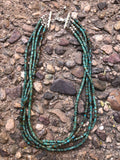 Natural green turquoise heishi in 4 strand with sterling silver 17.5”. By A.S.  CAMP14