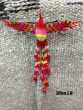 Guatemalan handcrafted barrettes made with top quality glass beads .