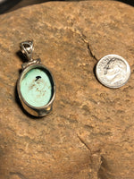 Turquoise stone pendant handcrafted in sterling silver