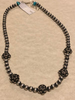 Sterling Silver necklace in oxidized beads and lotus flower beads.  Adjustable length from 15” to 17”. SR147