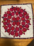 Vintage fabrics put together to form a one of a kind pillow cover.  Cherries