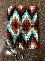Guatemalan handcrafted glass beadwork change purse with key ring. 4” x 3”. SALE!!