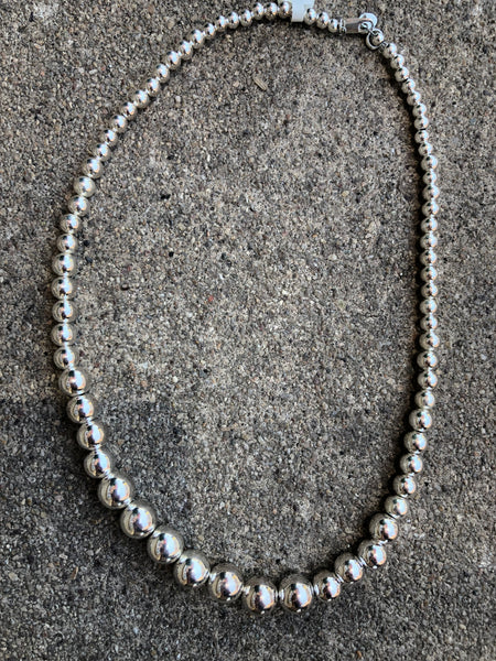 Navajo Pearl inspired seamless sterling silver graduated beads in a 20” necklace, by A.S.    11 FREE SHIPPING IN THE CONTINENTAL USA.