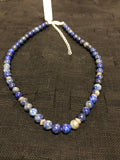 Genuine Lapis with sterling silver in an adjustable length from 15-18”. SR133