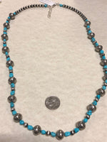 Navajo style pearls with genuine Kingman turquoise in an adjustable length from 23” to 25”. SR116