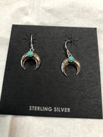 Sterling silver and genuine turquoise wire earrings. PS21