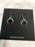 Sterling silver and genuine turquoise wire earrings. PS21