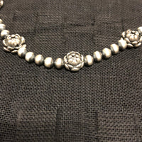 Sterling Silver necklace in oxidized beads and lotus flower beads.  Adjustable length from 15” to 17”. SR147