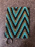 Guatemalan handcrafted glass beadwork change purse with key ring. 4” x 3”. SALE