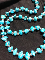 Persian style natural turquoise with alternating sterling beads 27” long