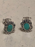 Sterling silver and genuine turquoise post earrings.  PS8