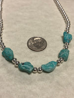 Genuine Campitos Turquoise nuggets in a matte finish, natural color with sterling silver 4mm beads.  15”.   SR122