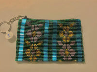 Change purse with key ring, hand beaded on both sides.