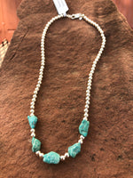 Genuine Campitos Turquoise nuggets in a matte finish, natural color with sterling silver 4mm beads.  15”.   SR122