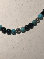 Genuine Turquoise, Black Onyx, and sterling silver in an adjustable length choker necklace.  SR134