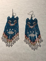 Guatemalan handcrafted glass seed beads earrings in wolf head motif.