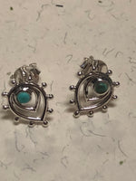 Sterling silver and genuine turquoise post earrings. PS10