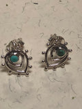 Sterling silver and genuine turquoise post earrings. PS10