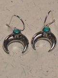 Sterling silver and genuine turquoise wire earrings. PS21