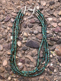 Natural green turquoise heishi in 4 strand with sterling silver 17.5”. By A.S.  CAMP14 FREE SHIPPING IN THE CONTINENTAL USA.