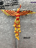 Guatemalan handcrafted barrette with the finest glass beads in a hummingbird motif.