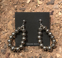 Navajo Pearl inspired sterling silver embossed bead earrings, star pattern