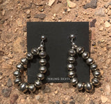 Navajo Pearl inspired sterling silver embossed bead earrings, star pattern