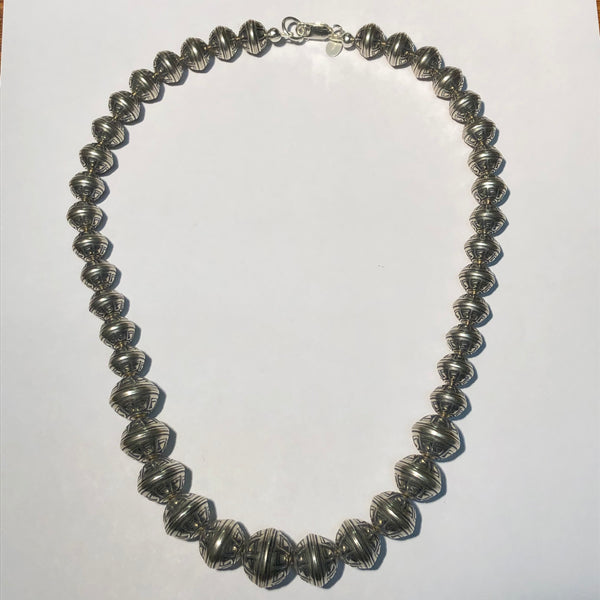 Navajo Pearl style graduated sterling silver beads necklace. 20