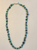 Genuine Campitos Turquoise with Genuine Lapis chips and sterling silver beads and clasp.  16” choker style by A.S.    AS606