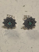 Sterling silver and genuine turquoise post earrings. PS13