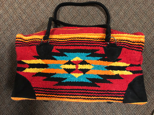 Handwoven Recycled Acrylic weekender bag.  18” x 8” wide, 8” tall.