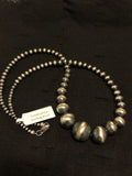 Desert Pearl beads (Navajo Pearls) necklace (22”) in sterling silver, graduated from 3mm to 16mm. AS-615