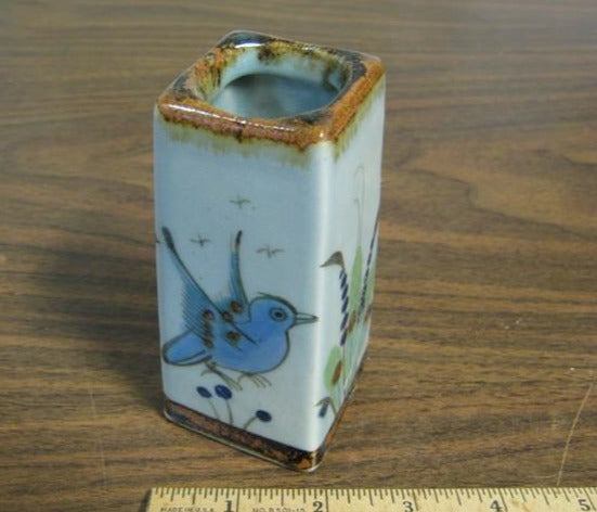 square vase with bird decoration