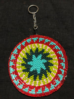 Guatemalan handcrafted glass bead round change purse with key ring. 3.5” diameter.