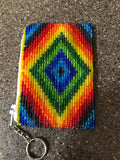 Guatemalan handcrafted glass beadwork change purse with key ring. 4” x 3”