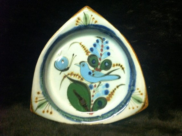 Triangular tray with bird and insect designs
