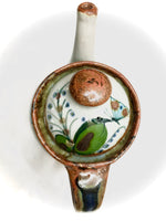 Tea pot in brown trim with butterfly lid.