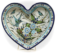 A blue rim heart design tray with bird and butterfly interior.