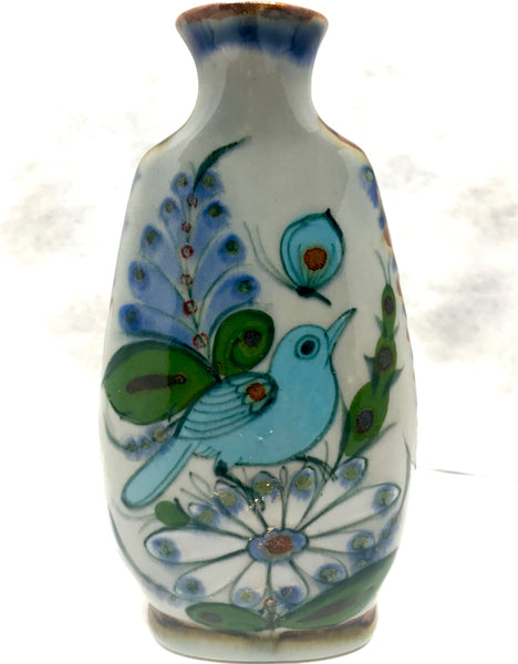 Vase with brown rim, grey clay color background blue bird and butterfly