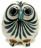 Ken Edwards Pottery round face owl in several Ken Edwards colors.