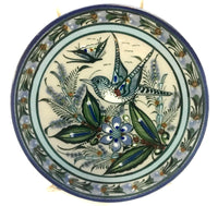Blue rim with bird in center