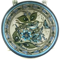 This 5" Ken Edwards collection series dessert bowl or can be used as an individual vegetable serving bowl.  It is natural grey clay color background with birds, butterflies, and leaves in blue, green, black and brown on the outside. 