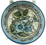 This 5" Ken Edwards collection series dessert bowl or can be used as an individual vegetable serving bowl.  It is natural grey clay color background with birds, butterflies, and leaves in blue, green, black and brown on the outside. 