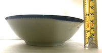 This 5" Ken Edwards collection series dessert bowl or can be used as an individual vegetable serving bowl. It is natural grey clay color background with birds, butterflies, and leaves in blue, green, black and brown on the outside.