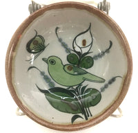 Ken Edwards desert bowl, 5' also known as a monkey dish in the restaurant trade.  The bowl has a brown rim with a bird and butterfly decorated inside the bow.  It is beautiful.