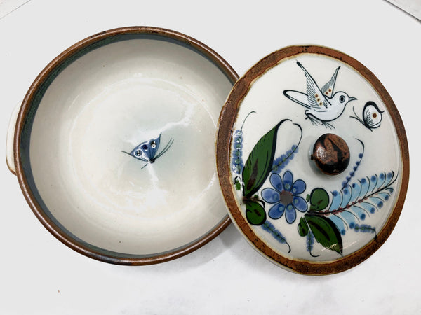 Casserole dish with brown rim on top and bottom, two pieces.