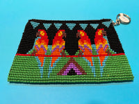 Guatemalan handcrafted glass bead change purse in intricate designs.