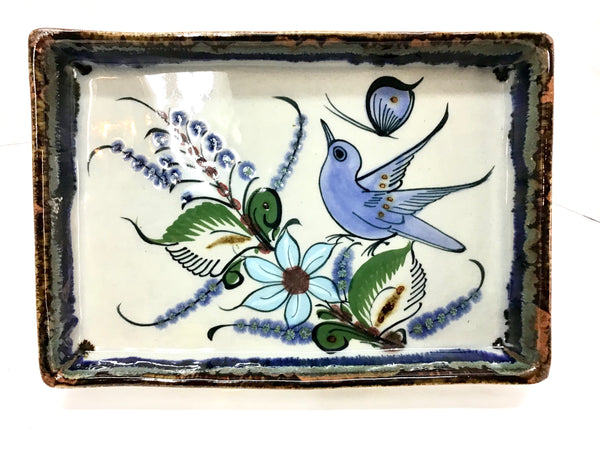 Ken Edwards Pottery rectangular tray with brown rim and bird, butterfly, flower, and leaf designs.